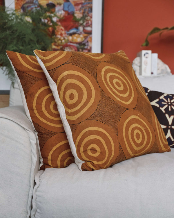 Story of Source Spiral Lou Zeldis batik cushion closeup